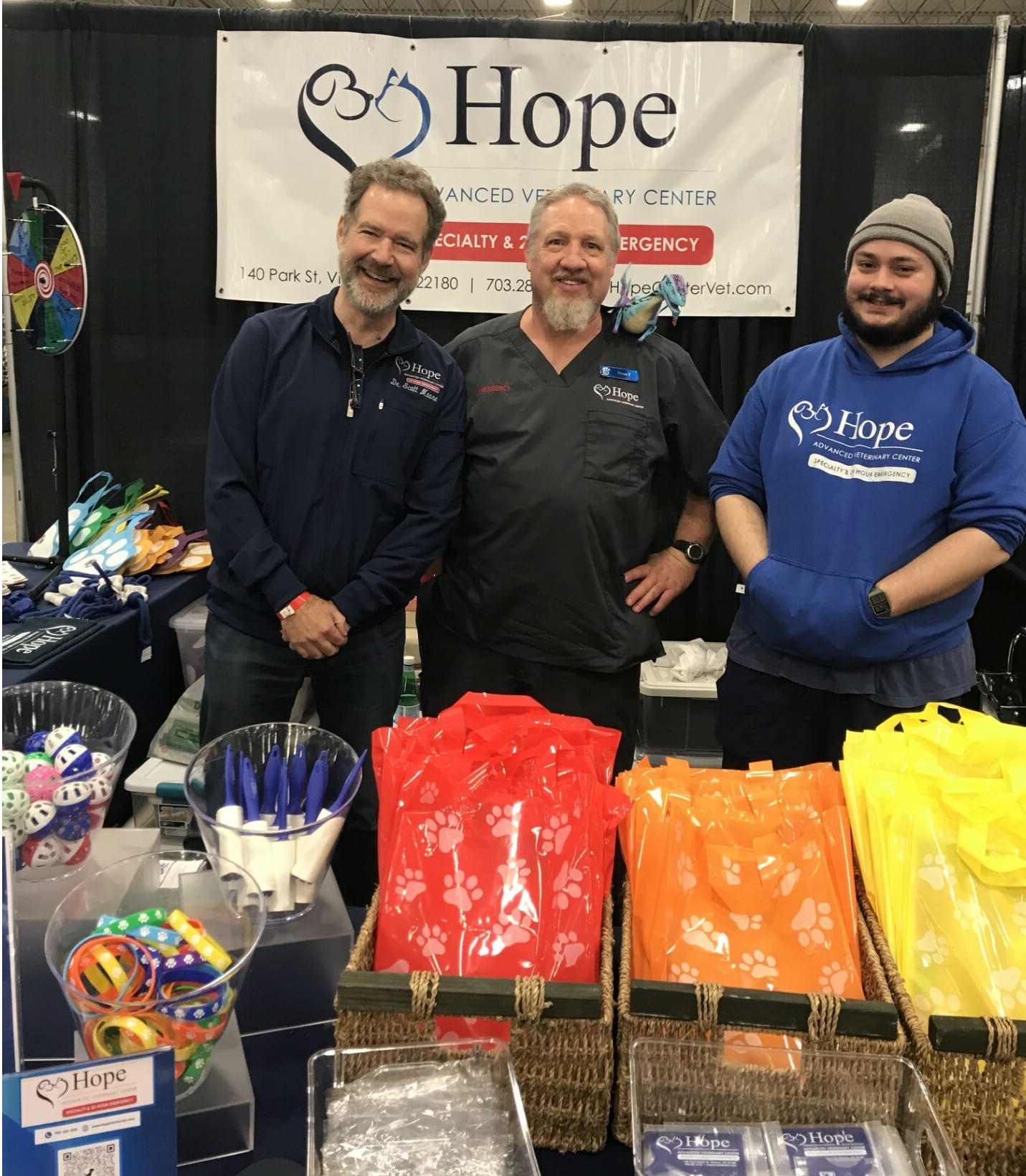 Some of our team in our colorful booth at Super Pet Expo 2025